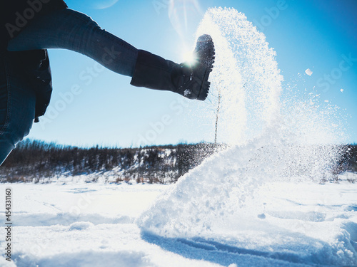 Boot Kicking Snow