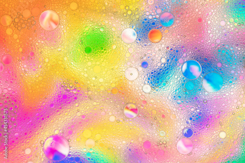   bstract image of oil and water bubbles of various colors. Colorful artistic image of oil drop on water for modern and creation design background.