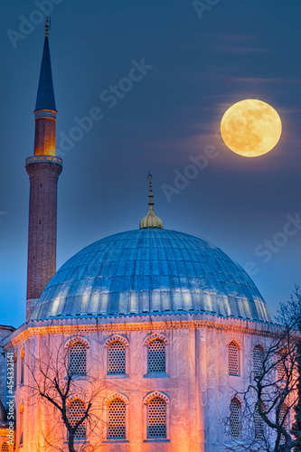 Photography Vertical shot of the Hagia Sophia Mosque under the full moon at night in Istanbul, Turkey