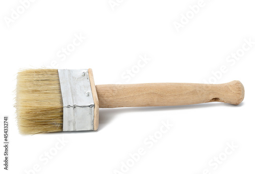 new paint brush with wooden handle isolated on white background