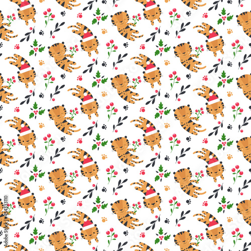 Seamless pattern with tiger - symbol of 2022 in cartoon style