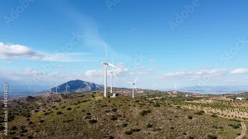 Windmills rotating in Spanish wind farm drone shot, aerial view of wind mill in Spain.