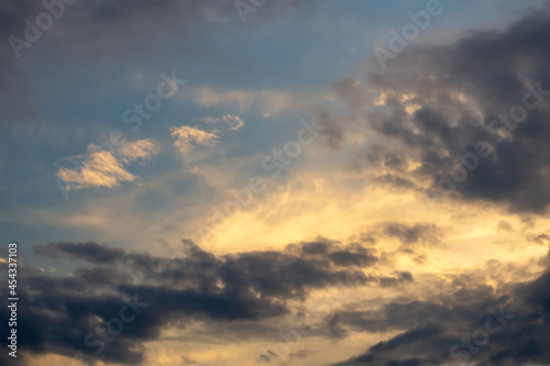 Beautiful clouds at sunset. Close-up. Natural background. © vallerato