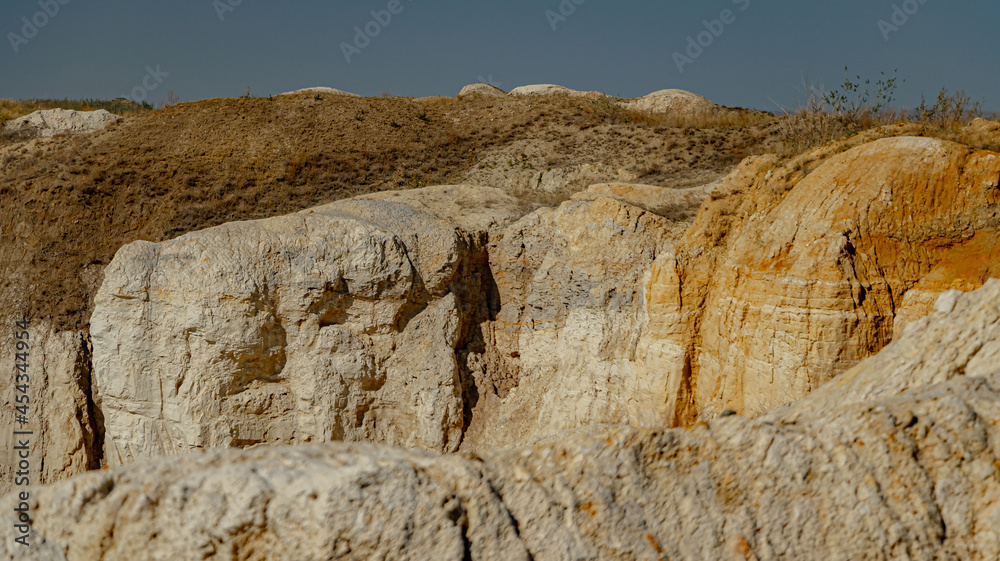 An abandoned sand quarry in dark colors. Soft focus