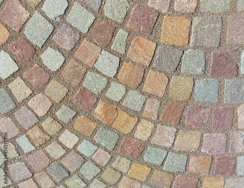 Porphyry external paving in cubes texture background 