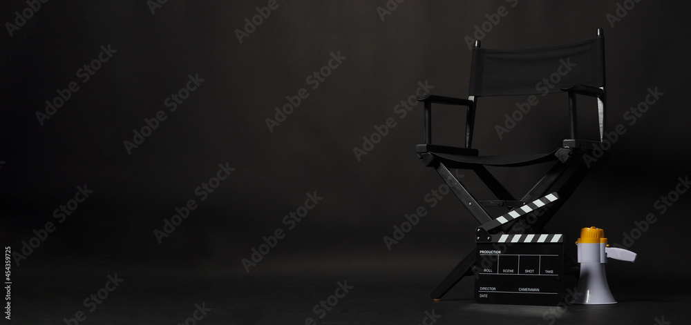 Black director chair and Clapper board or movie Clapperboard with ...