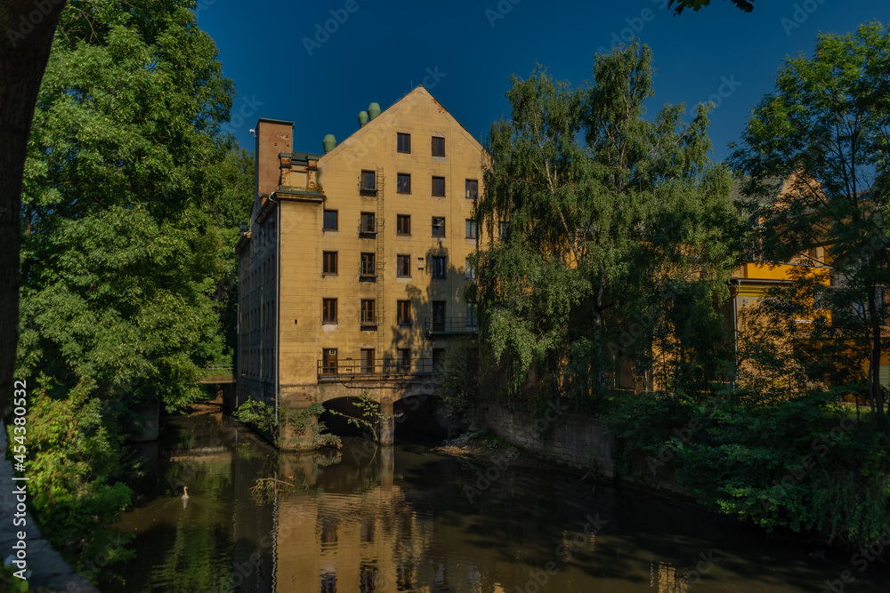 Old color big house mill in Litomerice town in north Bohemia in summer evening Old color big house mill in Litomerice town in north Bohemia in summer evening