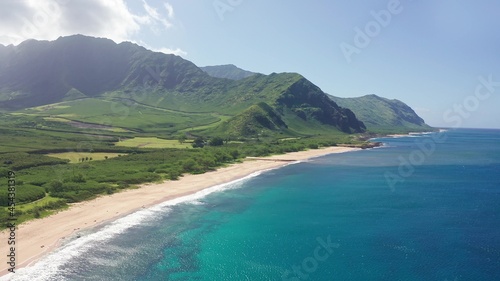 Aerial view from above down Drone shot. Beautiful tropical beach sea with white sand. Top view. Empty and clean beach in summer season on Oahu Hawaii Island.