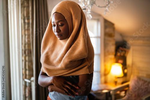 Portrait of beautiful young black african muslim woman wearing headscarf