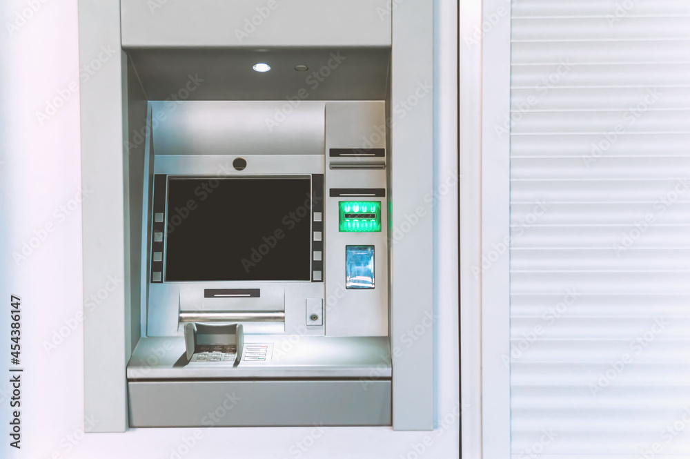 Mock Up, ATM machine in the city. against the background of white roller blinds. Mock Up, ATM machine in the city. against the background of white roller blinds.
