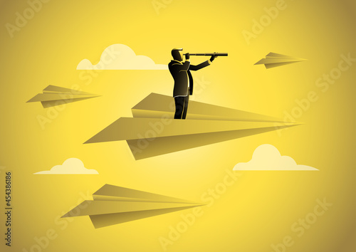 Businessman using telescope on paper plane