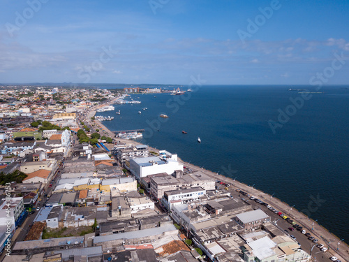 Beautiful drone aerial view of Santarem city skyline and Tapajos River in Amazon Rainforest on sunny summer day. Para, Brazil. Concept of nature, conservation, environment, ecology, tourism, travel. photo