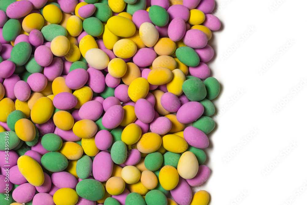 Group of colorful peanuts in glaze.