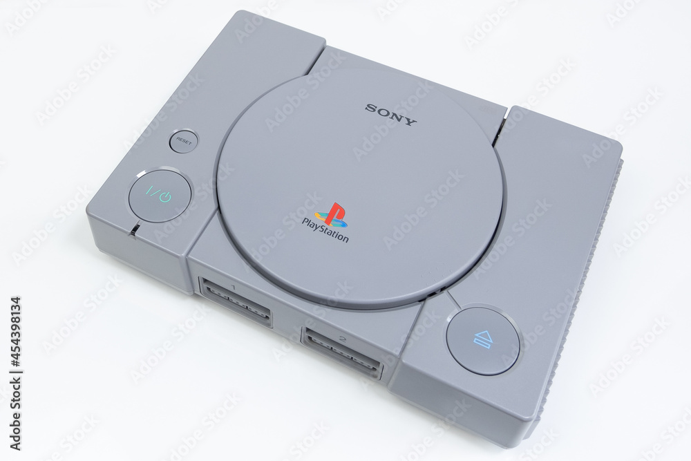 Sony PlayStation on white table. Original 1990s video games console. Stock  Photo | Adobe Stock