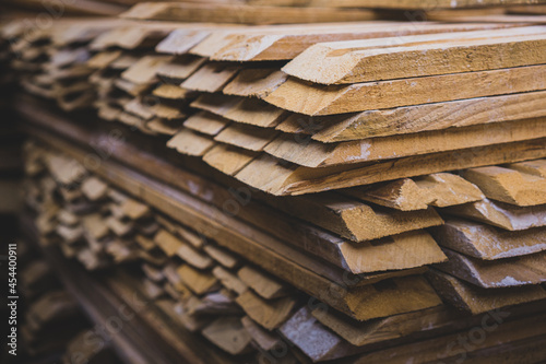 Wood for furniture, construction and crafts. Timber cut and stacked in lumber. 