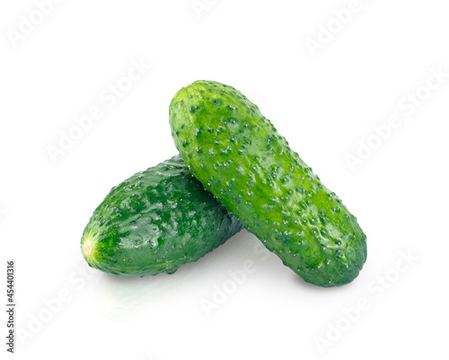 Two ground cucumbers isolated on white with shadow and reflection