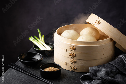 Photography Chinese steamed buns baozi with steamer