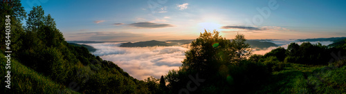 Fototapeta Naklejka Na Ścianę i Meble -  bright sunrise in the mountains with blue sky