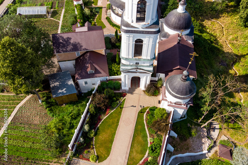 Bell tower and cathedral of the Orthodox Chernoostrovsky monastery in Maloyaroslavets, Russia, beautiful aerial view. June 2021 photo