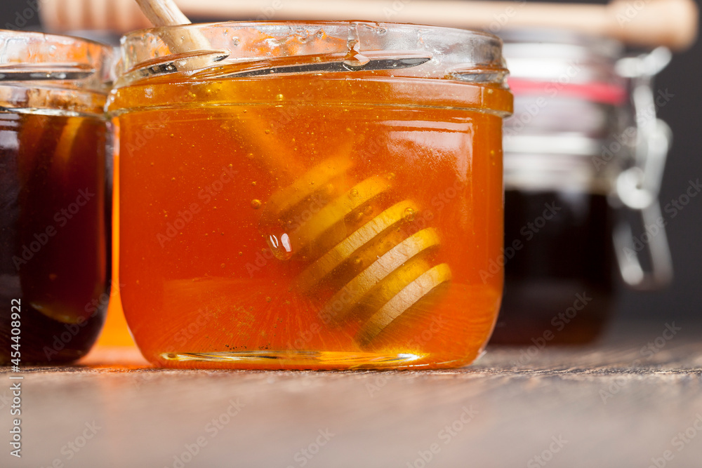 flower honey from different varieties of flowers, bottled in different cans