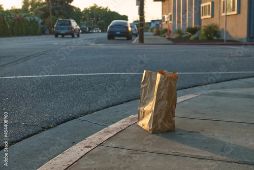 Grocery bag on a street corner photo
