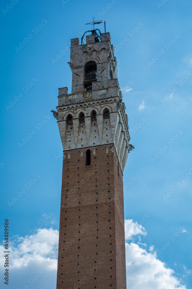 A photo of top part of Tower of Mangia, Siena, Italy
