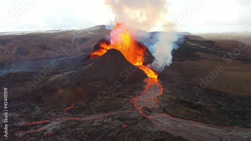 Amazing drone aerial of the dramatic volcanic eruption of the Fagradalsfjall volcano on the Reykjanes Peninsula in Iceland.
