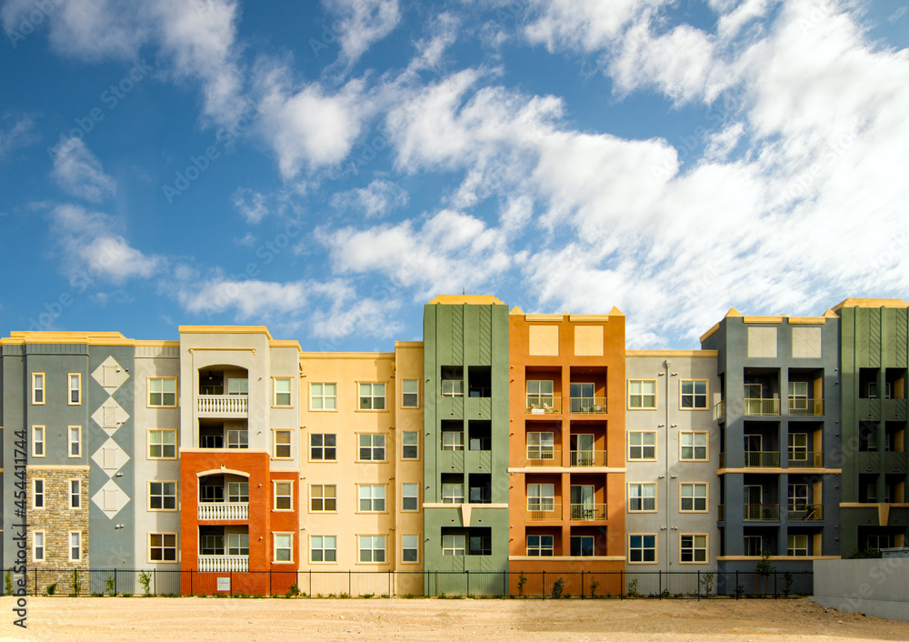 Variety of architectural styles in a row of condominiums Variety of architectural styles in a row of condominiums