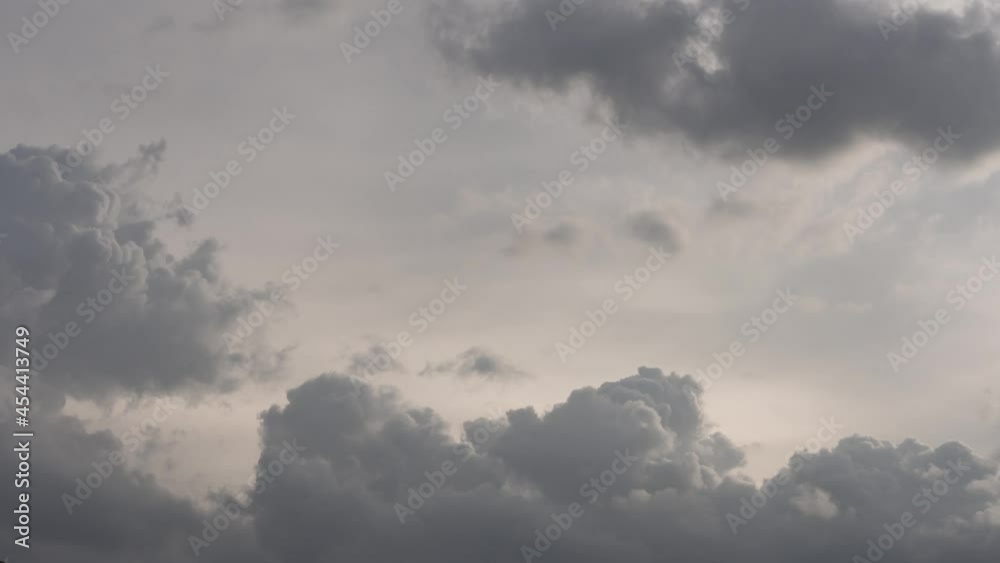Timelapse 4k b roll cloudscape, gray clouds in rainy season. aerial view sky before rain. dark dramatic rainstorm building in low level of the atmosphere. wet weather cloudy day. summer season sky Timelapse 4k b roll cloudscape, gray clouds in rainy season. aerial view sky before rain. dark dramatic rainstorm building in low level of the atmosphere. wet weather cloudy day. summer season sky