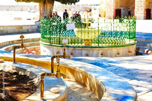 Jerusalem, Israel - 04 Jule 2021: modern taps for ablutions and The al-Kas ablution fountain for Muslim worshippers on the southern portion of lower platform. in Old City of Jerusalem. Temple Mount. © Kira