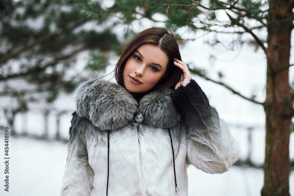 Fashion close up portrait pretty confident woman standing posing outside street park nature dressed trendy eco friendly artificial fur coat winter clothes nose piercing face big lips
Fashion close up portrait pretty confident woman standing posing outside street park nature dressed trendy eco friendly artificial fur coat winter clothes nose piercing face big lips