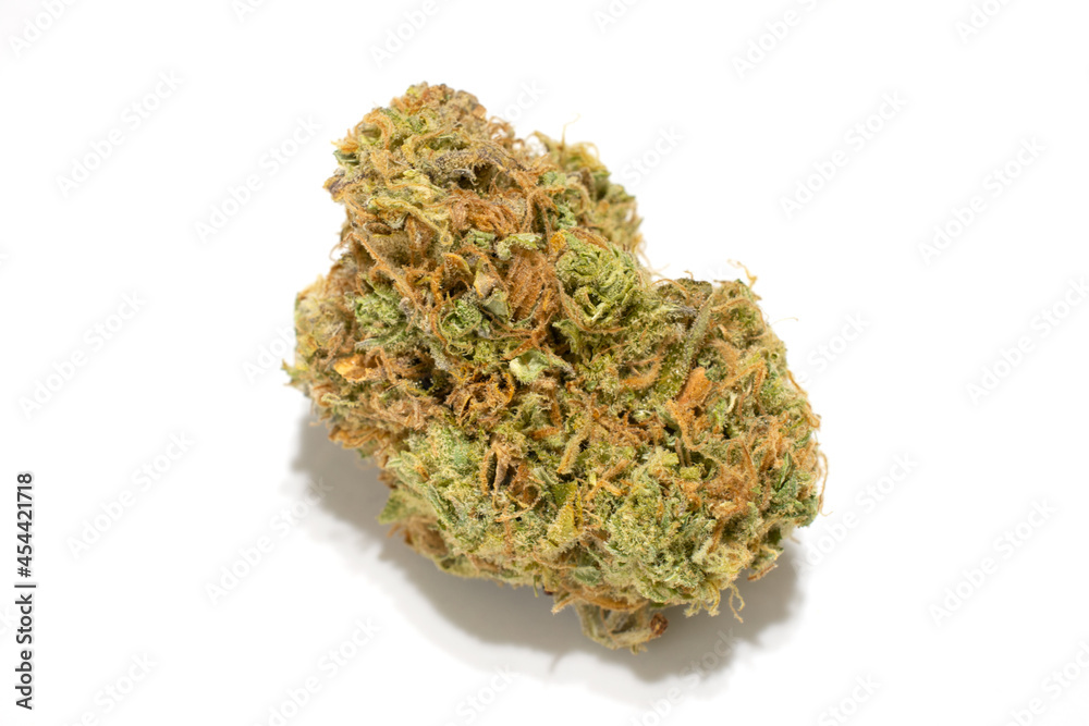 Golden Goat single cannabis flower bud, isolated on a white background. Golden Goat single cannabis flower bud, isolated on a white background.