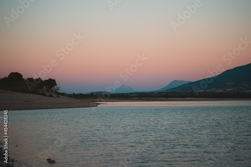 Calm waters in Yesa lake during sunset
