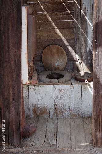 Old times rural wooden outhouse toilet