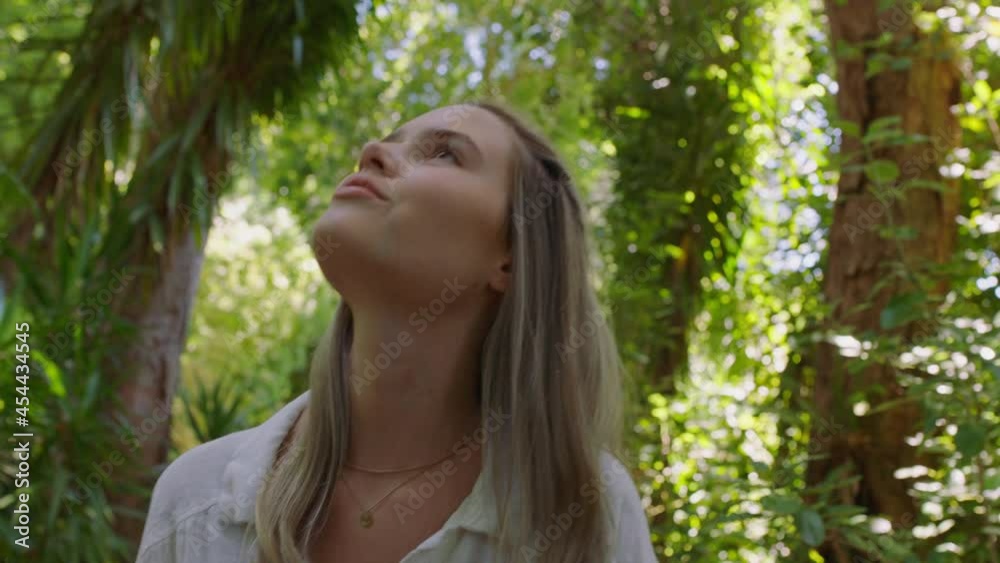 beautiful woman walking in forest nature girl exploring lush garden enchanted by natural beauty outdoors 4k beautiful woman walking in forest nature girl exploring lush garden enchanted by natural beauty outdoors 4k