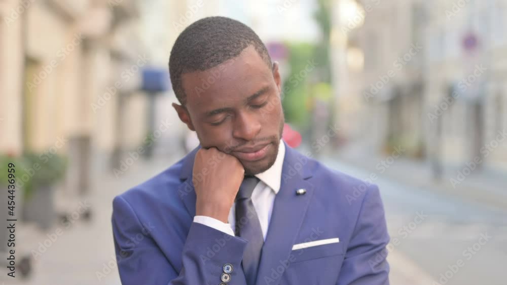 Outdoor Sleepy African Businessman Taking Nap Outdoor Sleepy African Businessman Taking Nap