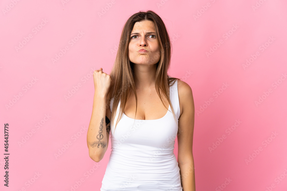 Young slovak woman isolated on pink background with unhappy expression Young slovak woman isolated on pink background with unhappy expression