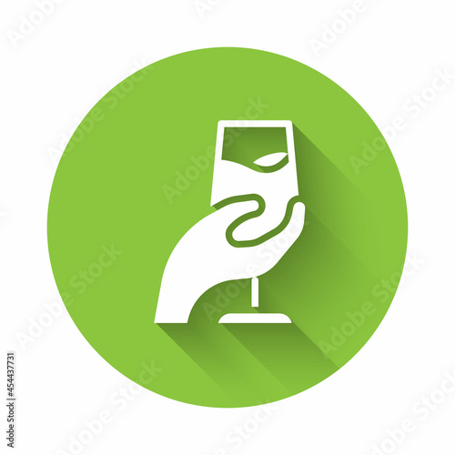 White Wine tasting, degustation icon isolated with long shadow background. Sommelier. Smells of wine. Green circle button. Vector
