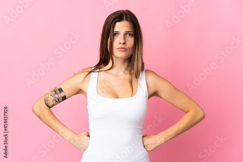 Young slovak woman isolated on pink background angry