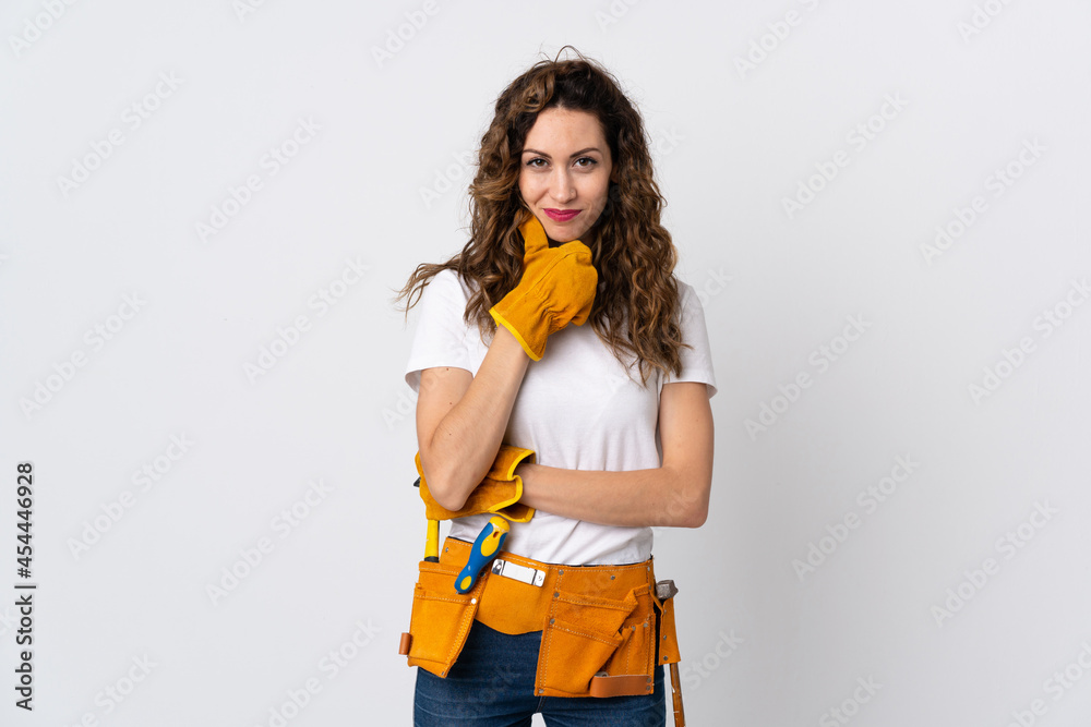 Young electrician man isolated on white background thinking Young electrician man isolated on white background thinking