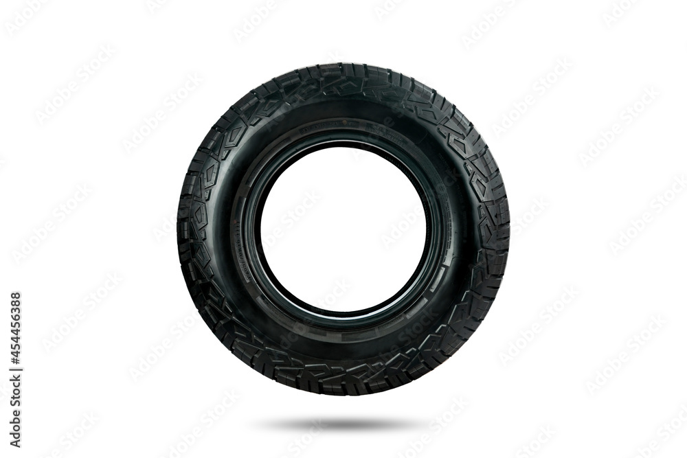 Side view of an all terrain tire designed for use in all road conditions isolated on white background.