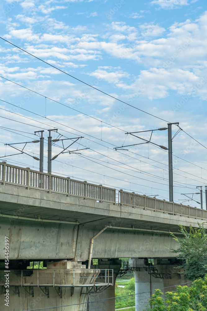 Close view of railroad bridge under blue sky. Close view of railroad bridge under blue sky.