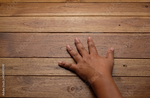 hands on wooden background