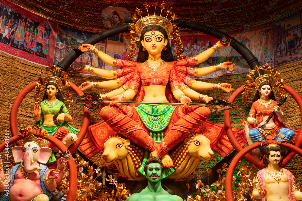 Hindu festival Navratri was celebrating. Devi maa Durga idol with her family in West Bengal, India.