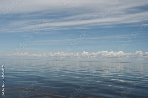  white sea   blue sky and clouds on the horizon