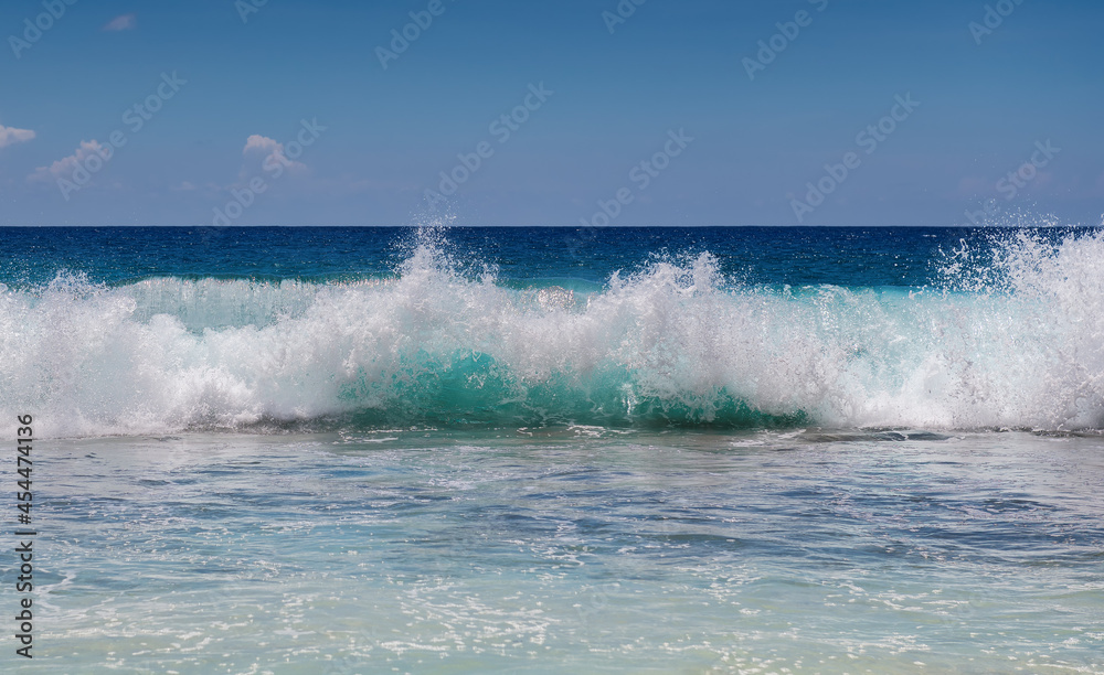 Ocean wave with white foam