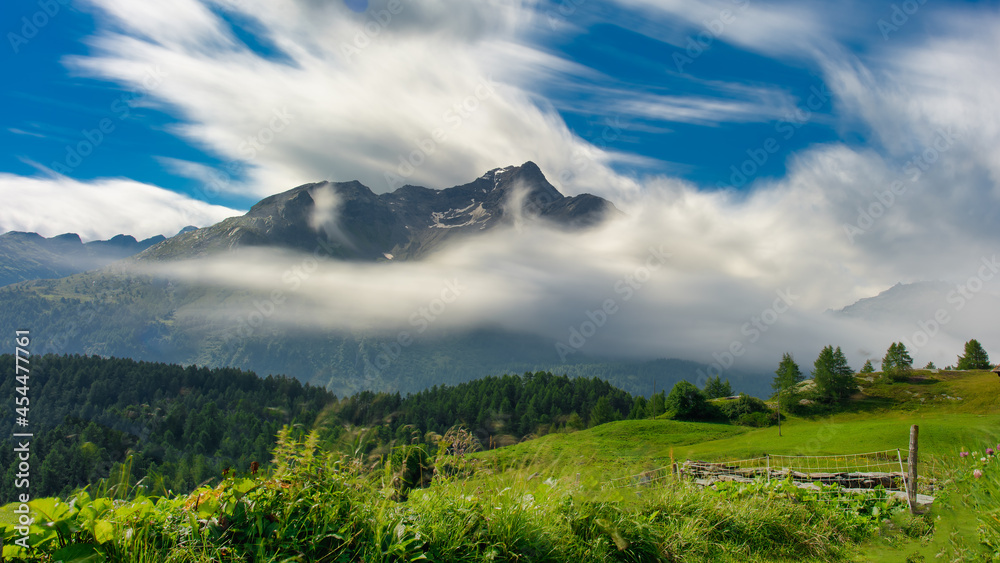 Mountain landscape with blurred clouds