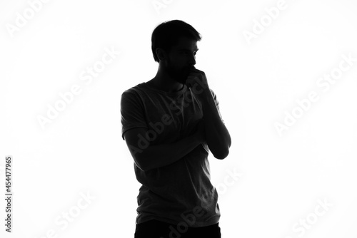 man in shadow gesture hands posing lifestyle anonymous