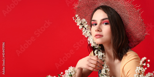 Beautiful young woman with ...