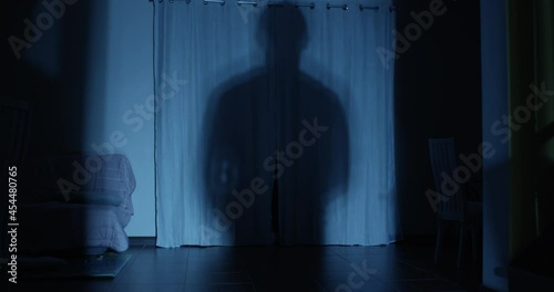 Murderer Opens the Door and Breaks in the House Carrying a Knife at Night
